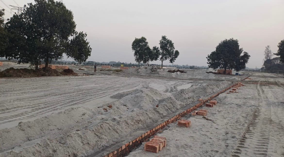 Prepared land and brick markers